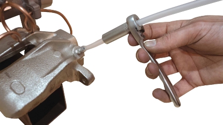 Ratelsleutel en doppen voor het ontluchten van remmen 